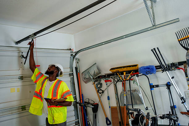 Professional Garage Door Panel Replacement technician working in Water Mill, NY